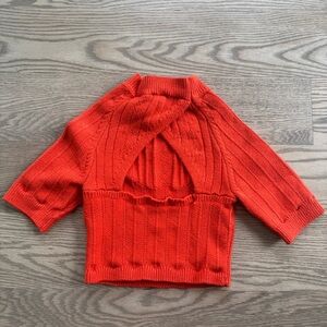Free People cropped sweater. Open back, Cable Knit. Orange.